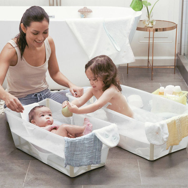 Stokke® Flexi Bath® zestaw 3w1, wanienka ze stojakiem i wkładką niemowlęcą | Transparent Calming Lavender