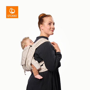 Stokke® Limas™ Carrier chusta–nosidełko ergonomiczne dla dziecka od 3 do 15 kg |  Floral beige OCS