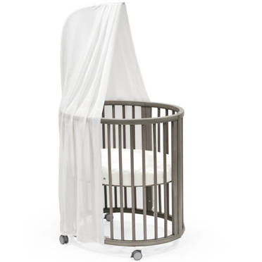 Stokke® Sleepi™ Mini V3 owalne łóżeczko–gniazdko niemowlęce na kółkach, kompletny zestaw bazowy | Hazy Grey